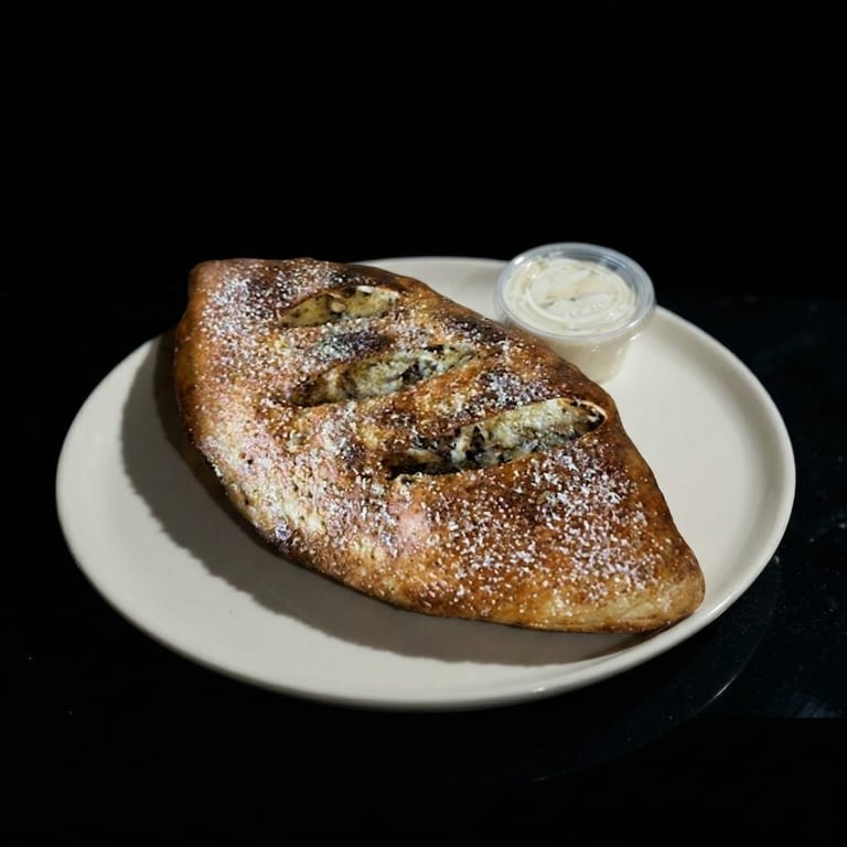 Indulge in Our Stromboli
